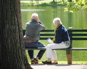 older couple on park bench
