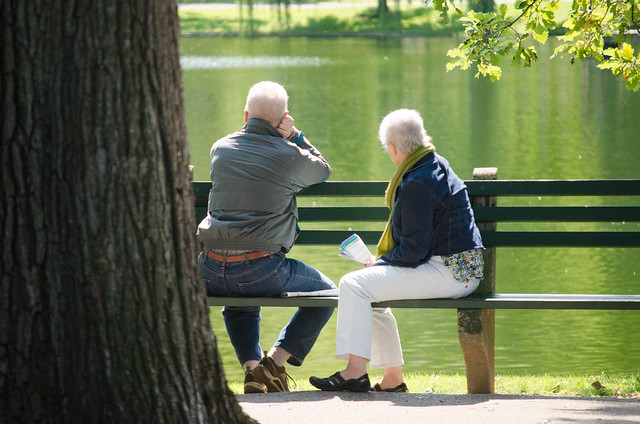 older couple on park bench